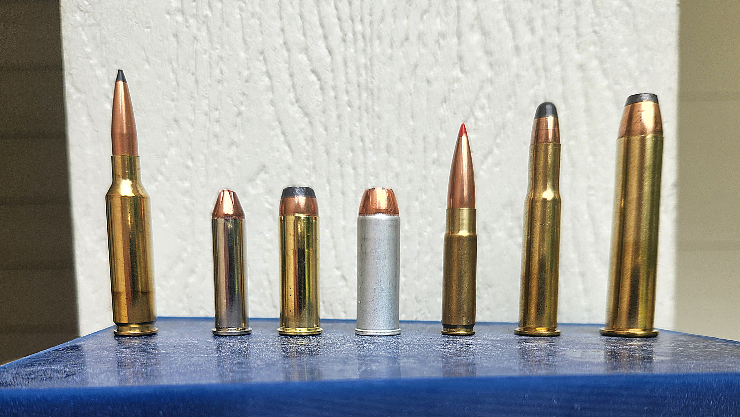 Deer cartridges discussed in the article, from l to r – 6.5 Creedmoor, .357 Mag, .44 Mag, .45 Colt, .300 BLK, .30-30, .45-70